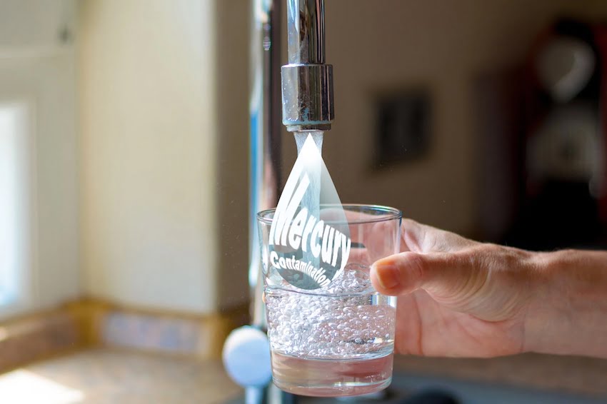 Image of a running drinking tap with mercury contaminated water